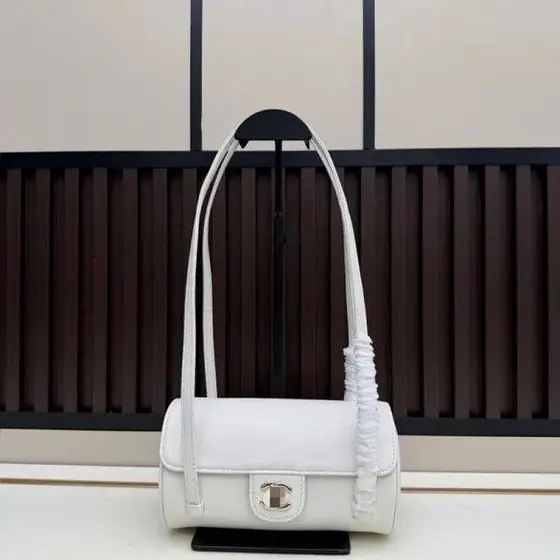 Xiaoxiangfeng 26P cylindrical flip bowling bag caviar cowhide metal buckle long