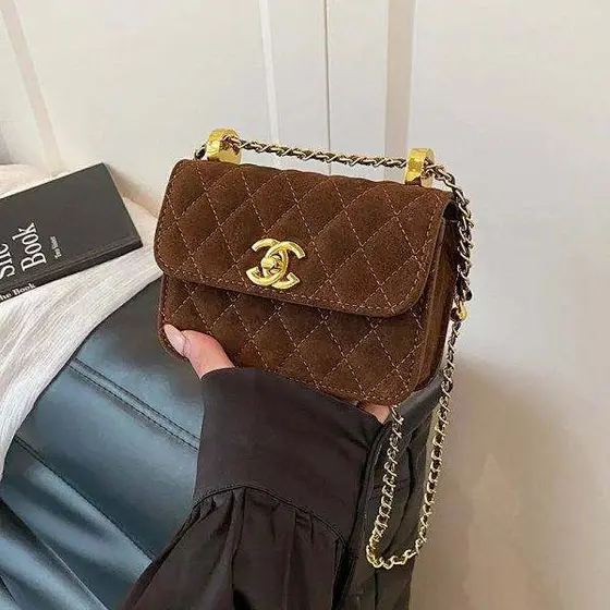 Chanel quilted suede mini bag
